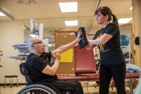 Patient undergoes rehabilitation therapy at Shepherd Center
